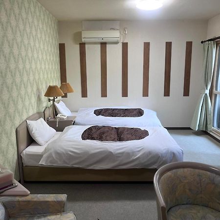 フューデイズコンドミニアム定山渓201号室 Apartman Szapporo Szoba fotó
