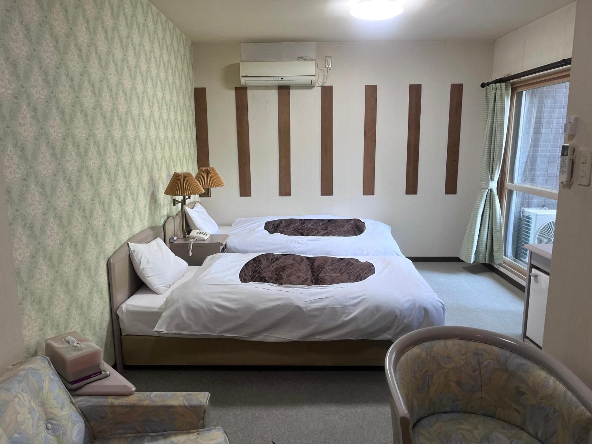 フューデイズコンドミニアム定山渓201号室 Apartman Szapporo Szoba fotó